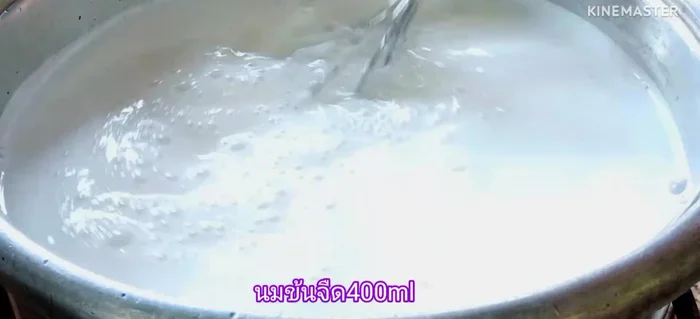 Add evaporated milk, followed by sweetened condensed milk.
