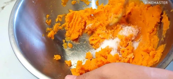 Add sugar and cassava flour to the sweet potato mixture.