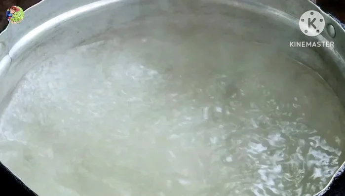 Put a pot of water on the stove and bring it to a boil.
