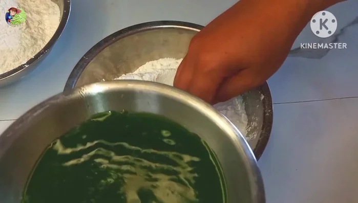Prepare the dough: Divide the glutinous rice flour into three portions. Knead each portion with pandan leaves water (green), water (white), and butterfly pea water (purple) respectively, until you get a smooth and soft dough.
