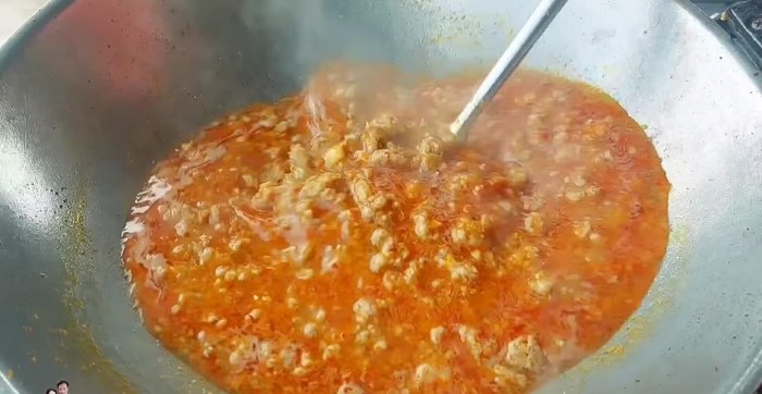 Simmer the curry until thickened and the flavors meld.