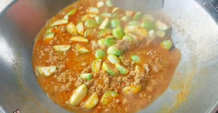 Stir the curry frequently to ensure even cooking of the eggplant.