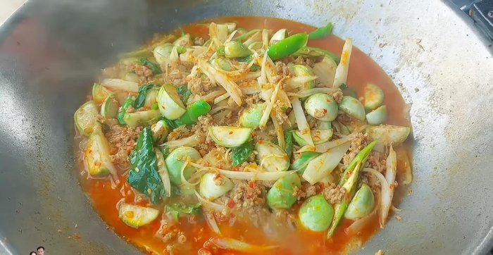 Allow the curry to simmer until the eggplant is cooked through but still slightly crisp.