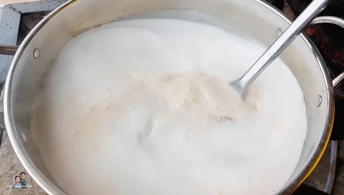 Add the prepared curry paste and stir to dissolve in the coconut milk.