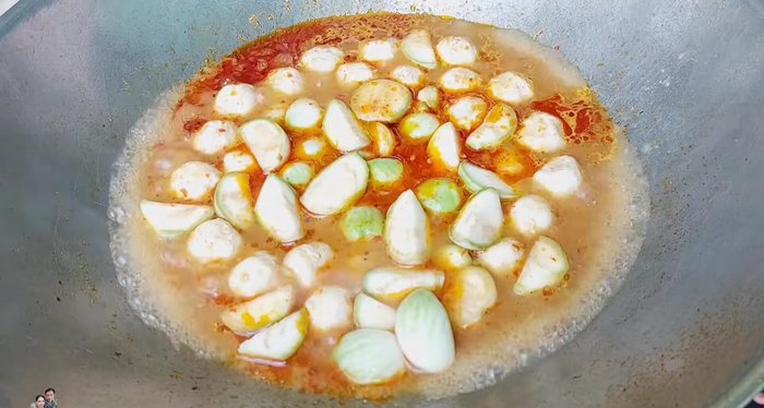 Add eggplant to the boiling curry and stir to prevent blackening.