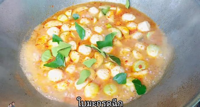 Add torn kaffir lime leaves when eggplant is almost cooked.