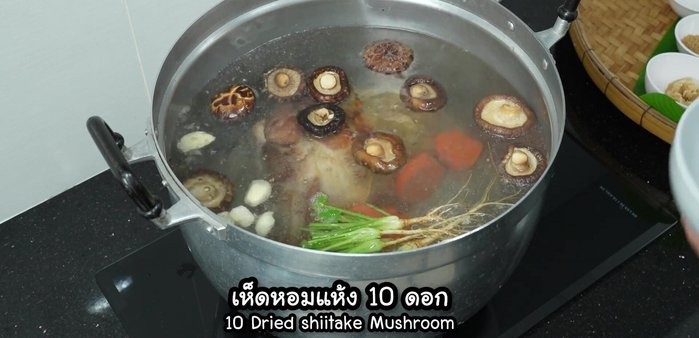 Add soaked shiitake mushrooms and the Chinese herbal medicine set to the pot.
