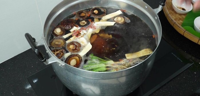 Simmer over low heat until the pork leg is tender (this may take several hours).
