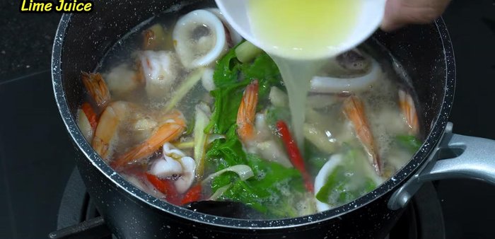 Turn off the heat. Season with fish sauce and plenty of lime juice.
