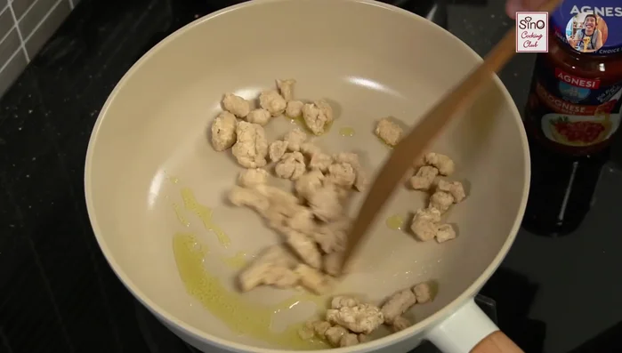 Add pan-based meatloaf (vegetarian substitute) and stir-fry until heated through and slightly browned.