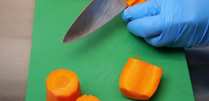 Soak in Cold Water. After carving, soak the carrot pieces in cold water to maintain their shape and color.