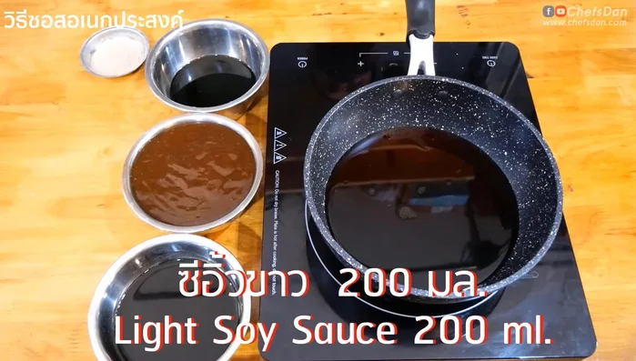 Prepare the sauce: Add sugar, light soy sauce, fish sauce, oyster sauce, green chili sauce, and peppercorns to a pan. Stir until combined.