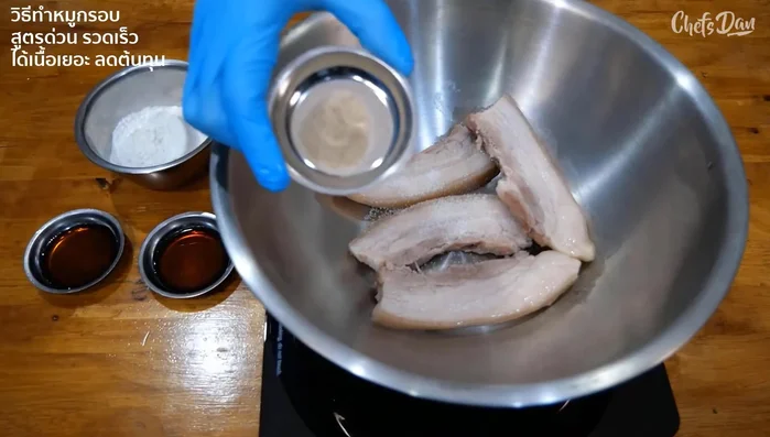 Season the boiled pork: Add seasoning sauce, sugar, and pepper to the cooked pork.