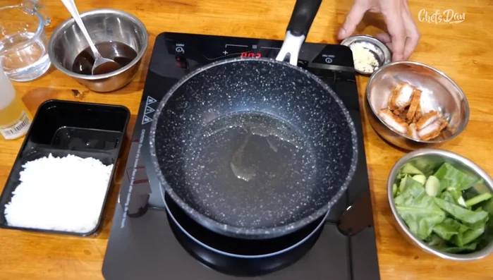 Prepare the kale: Stir-fry garlic in a pan, add kale and a little water. Cook until softened.