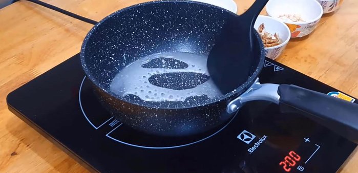 Gradually increase the heat until the mixture boils and turns brown.