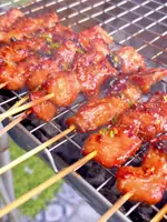 Spicy Grilled Pork (Moo Saeb Ping Yang): A Thai Street Food Delight