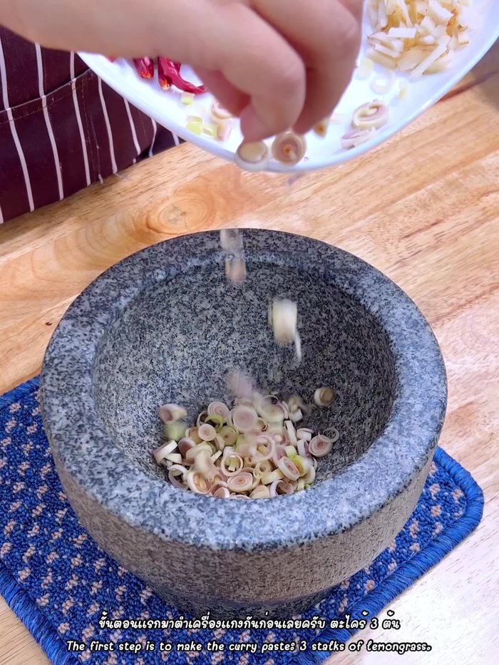 Make the curry paste: Pound together lemongrass, sesame seeds, dried chilies, and salt until roughly blended.