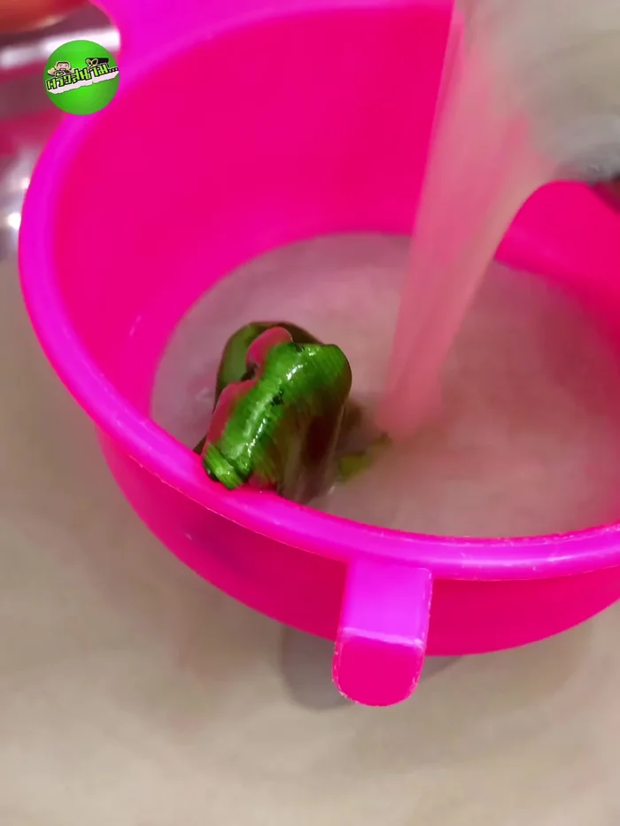 Prepare the custard: Mix eggs, sugar, coconut milk, salt, and pandan leaves until well combined. Strain to remove the pandan leaves.