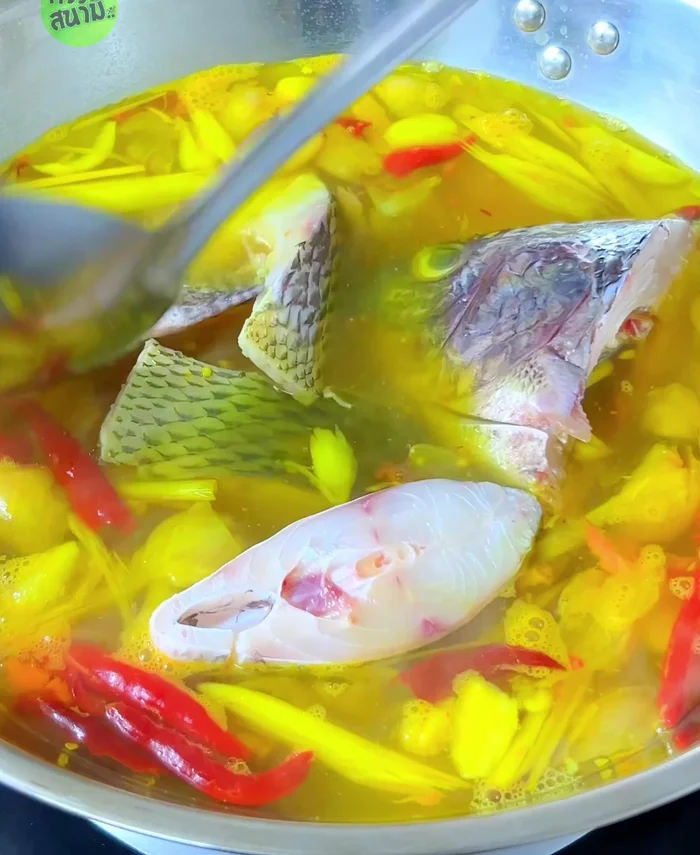 Simmer until the fish is cooked.