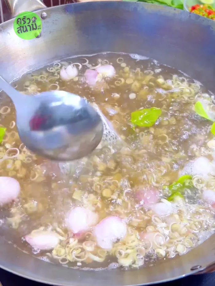 Add the sea bass fillets. Do not stir. Boil until the fish is cooked.