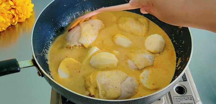 Add potatoes (cut into small pieces), fried onions, salt (1/4 teaspoon), coconut sugar (1 tablespoon), and fish sauce (1 tablespoon).