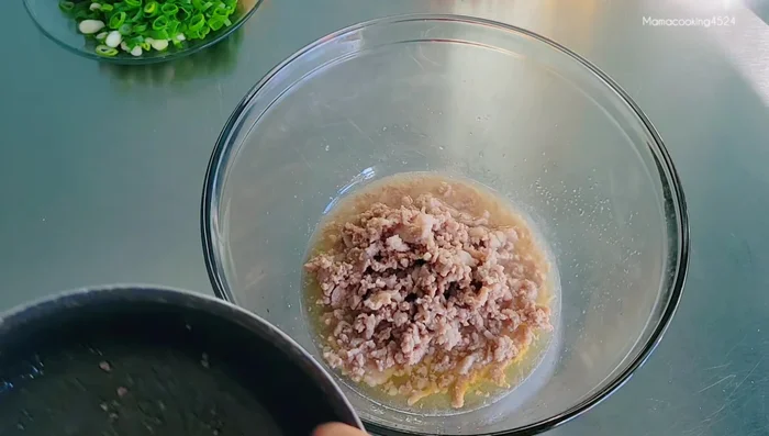 Add chili, ginger, and other ingredients like peanuts, spring onions, and coriander to taste.