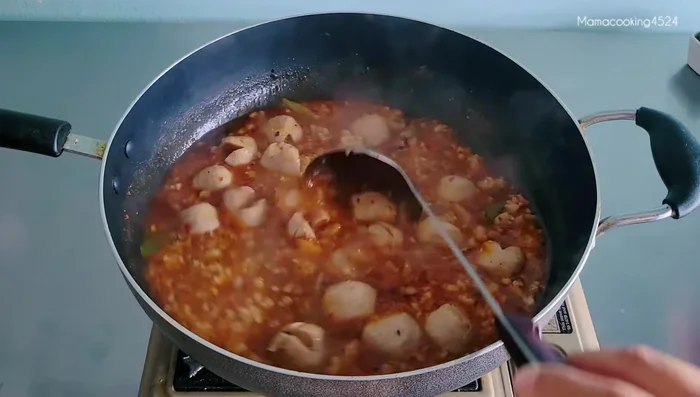 Add vegetables and spring onions.