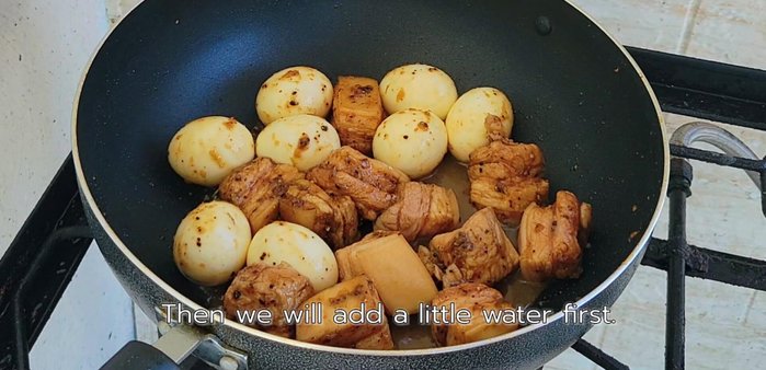 Add water to cover the eggs. Add 2 tablespoons of sweet soy sauce and 0.5 tablespoon of salty soy sauce.