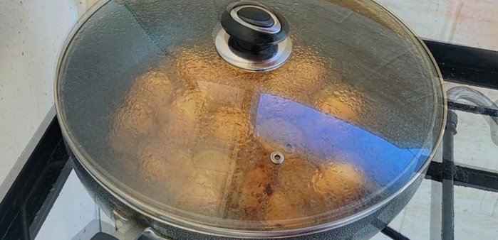 Close the lid and continue simmering for 1-1.5 hours, stirring every 15-20 minutes and adding water as needed to maintain moisture.