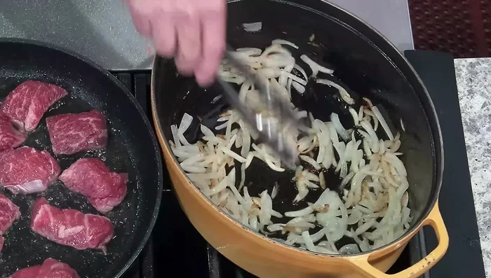Add chopped onions and sauté until caramelized.