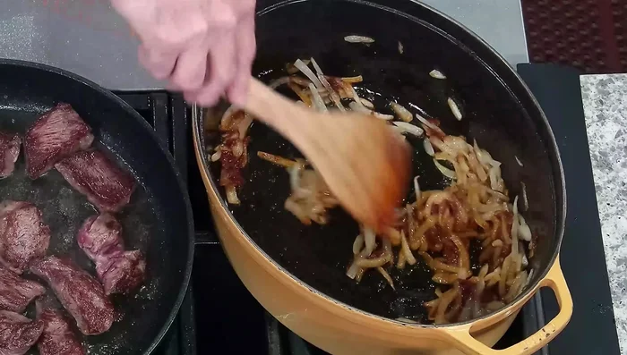 Add curry powder and sauté briefly to release the oils and enhance flavor.
