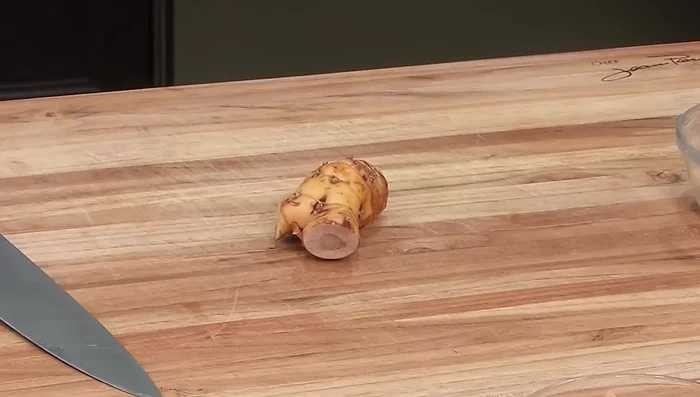 Add galangal (or substitute with ginger).