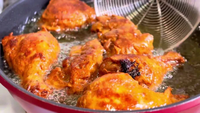 Take out the chicken and poke holes with a fork.