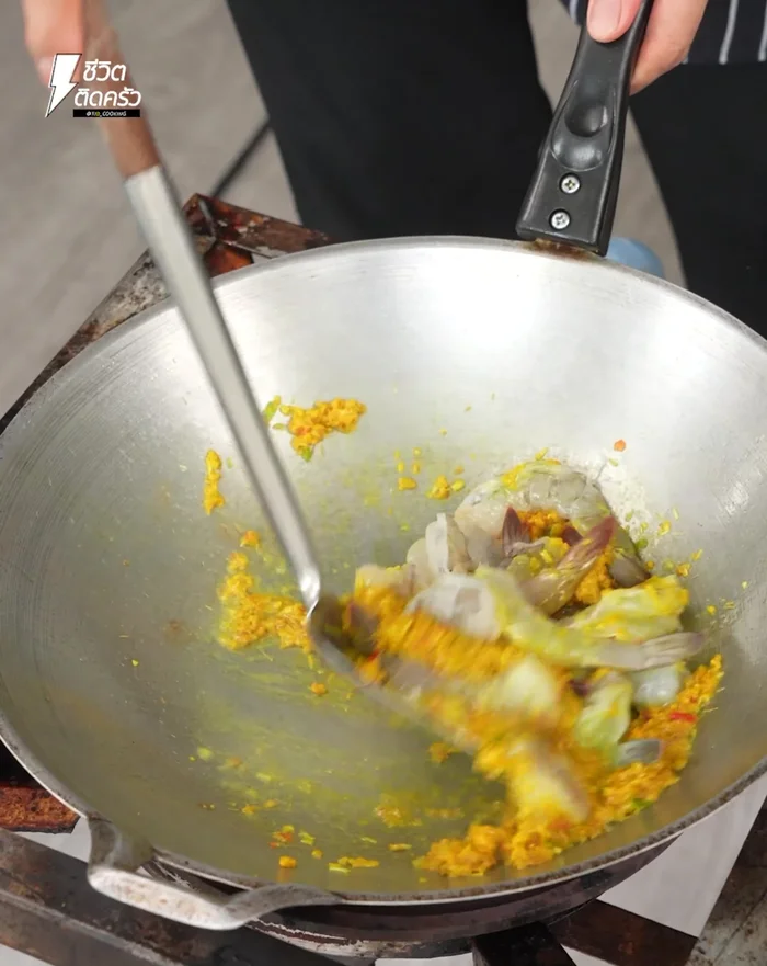 Add chopped lemongrass, garden chili, sugar, fish sauce, and seasoning powder. Stir to combine.